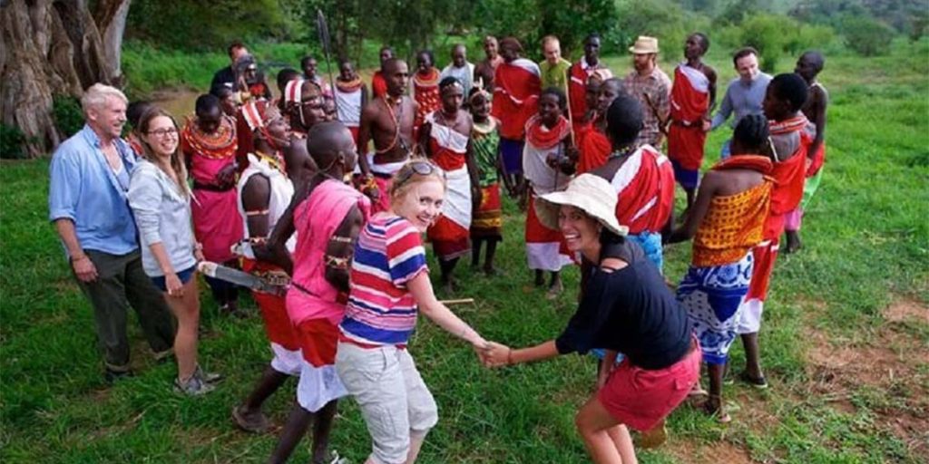 A number Kenyans having some good time with tourists SRC: @Discover Walks