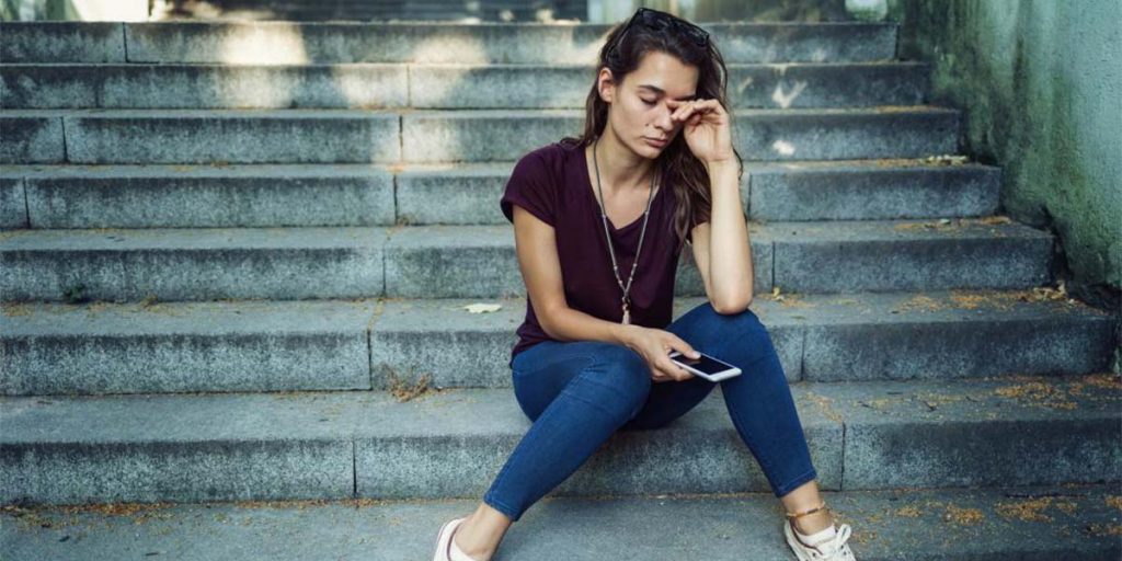 A woman experiencing depressive symptoms of bipolar disorder