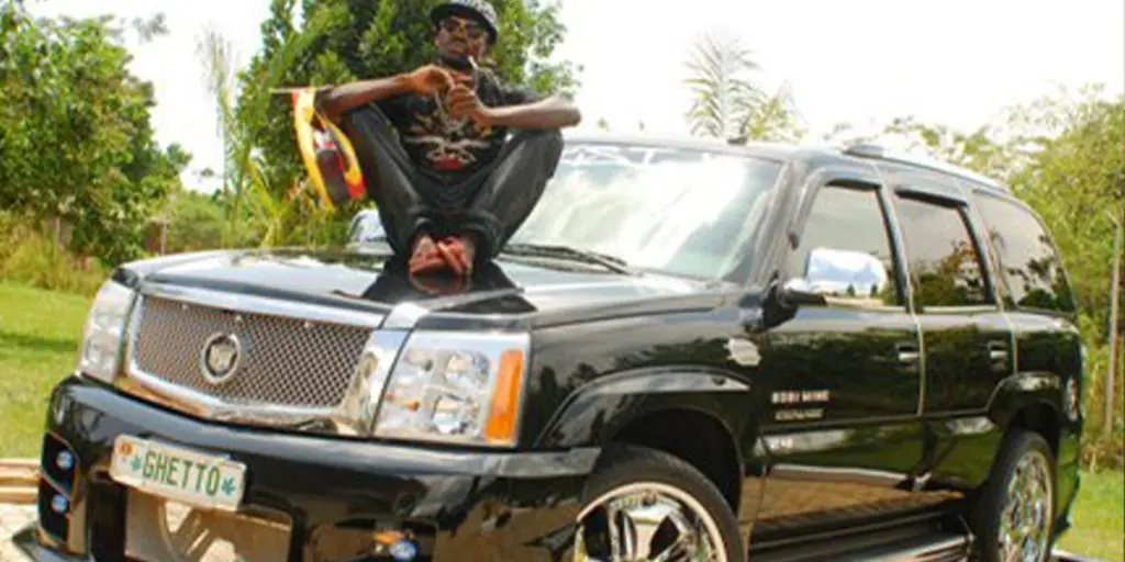 Bobi and his Escalade car SRC: @entebbe news