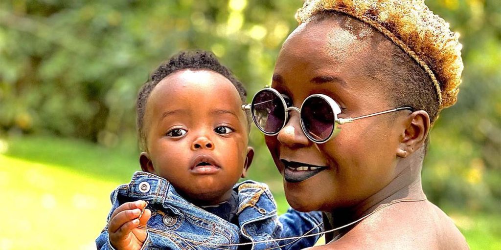 Kansiime posing for a photo with her son SRC: @Facebook
