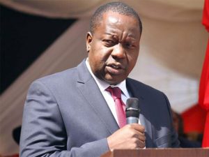 Read more about the article Dr Fred Matiangi biography, age, tribe, family, education, career, wife, children, salary, cars, and net worth