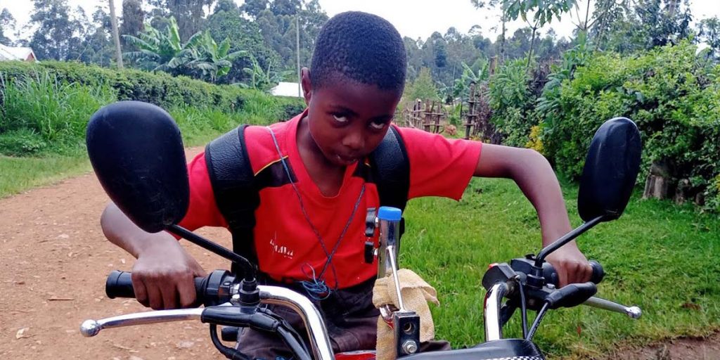 Onsongo riding a Motobike SRC: @Tambua Africa News