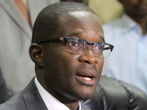 Read more about the article Ezra Chiloba biography, age, tribe, family, education, wife, children, current job, salary, net worth, latest news