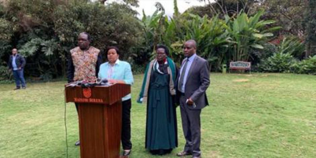 Cherera with three other commissioners while addressing Kenyans from Serena Hotel SRC: @Kenyans.co.