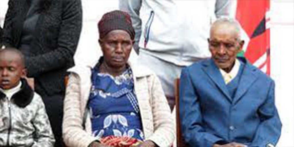 Faith Kipyegon parents posing for a photo SRC: @Daily Nation 